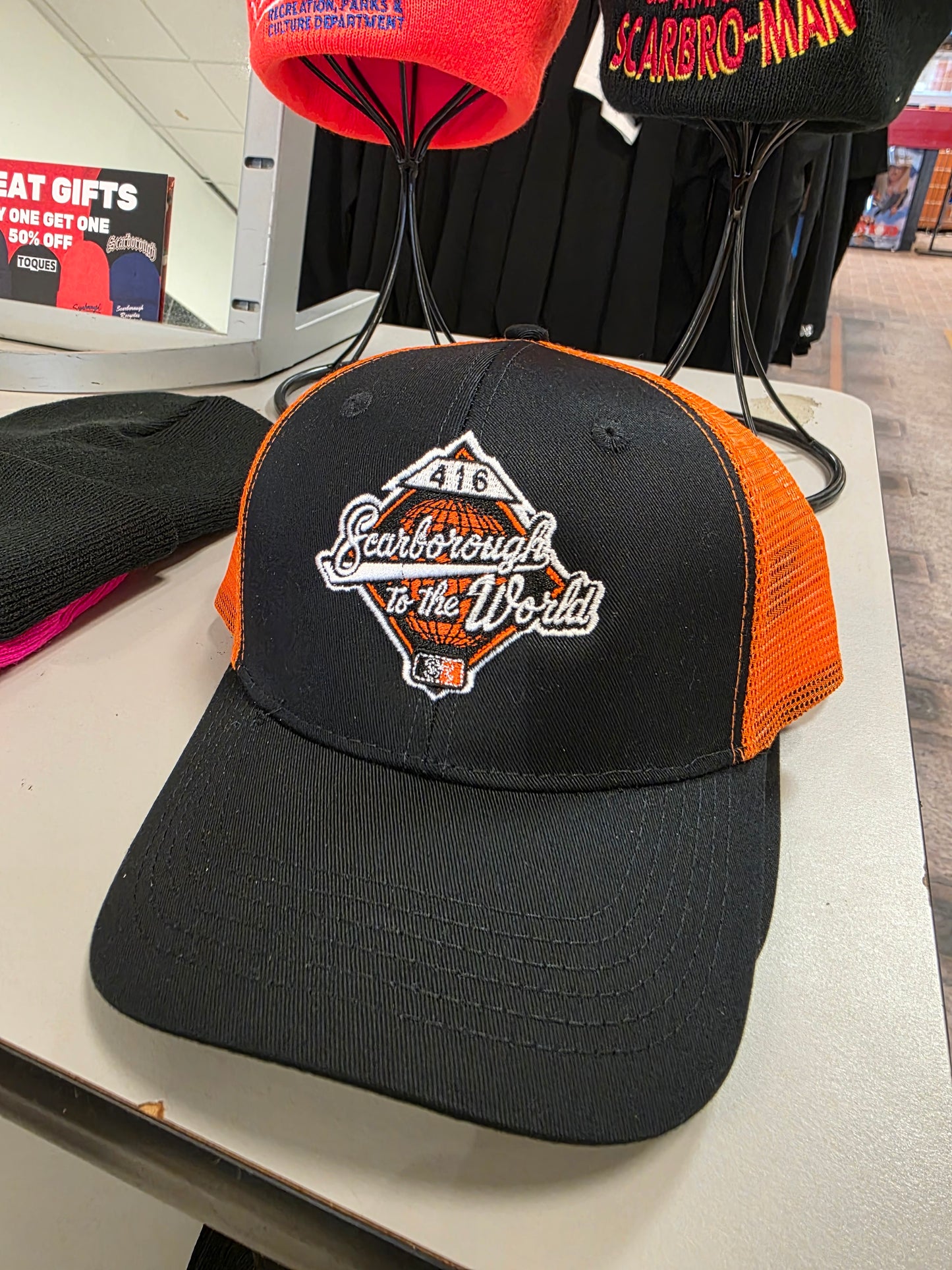 Scarborough to the World Fire Orange Trucker